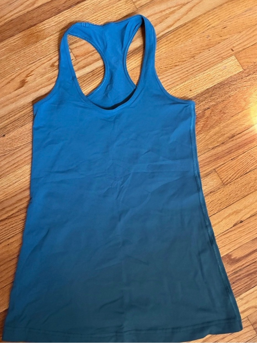 Set of 2 Lululemon athletica Teal Blue and  Navy blue razorback tank tops Size 4